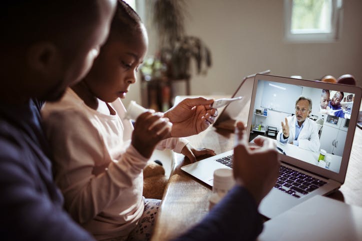 Dad and daughter telehealth